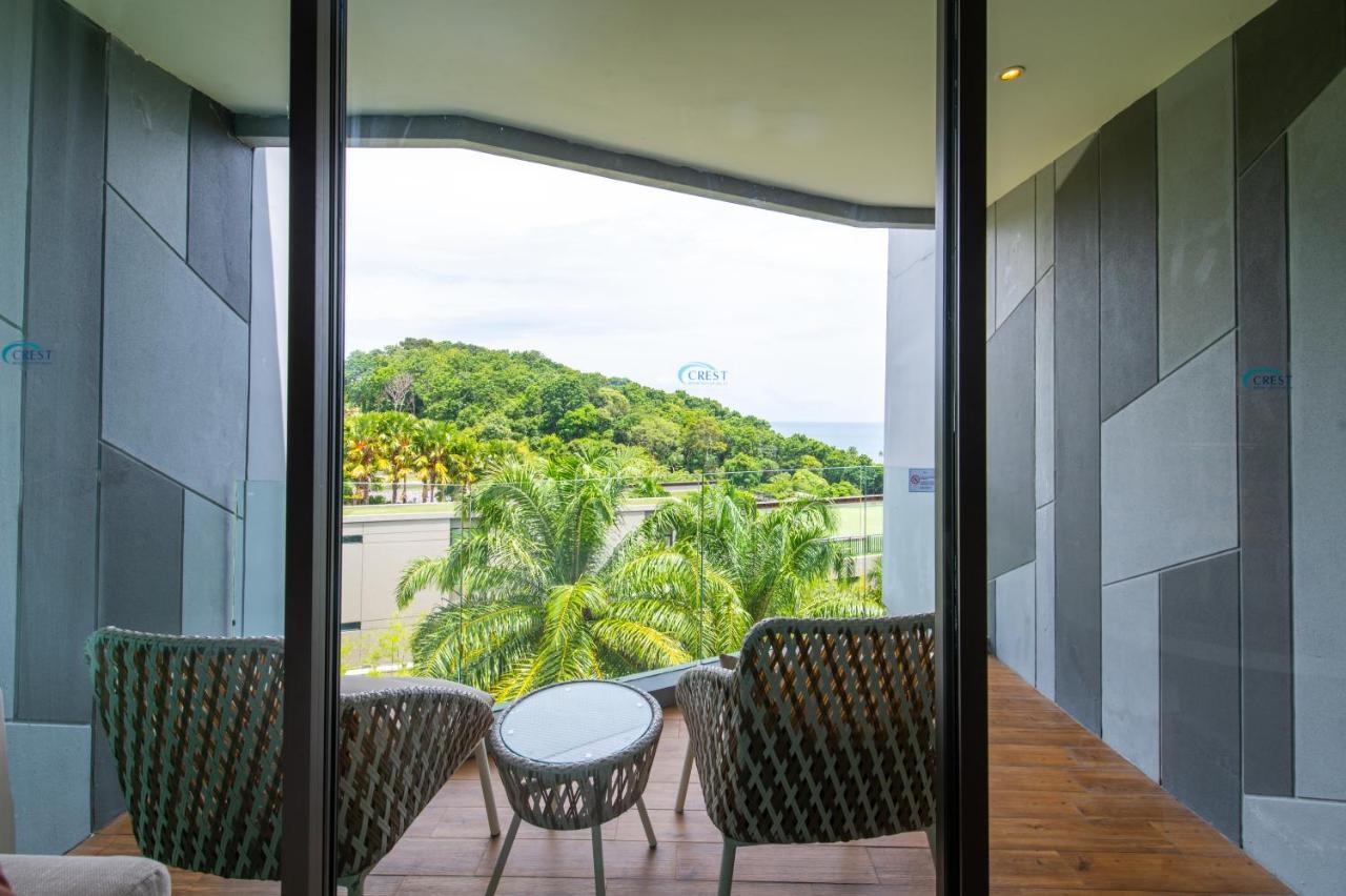 Crest Resort & Pool Villas - Sha Extra Plus Patong Exterior photo A balcony at the hotel